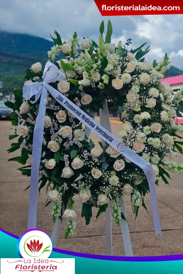 Corona fúnebre de flores blancas