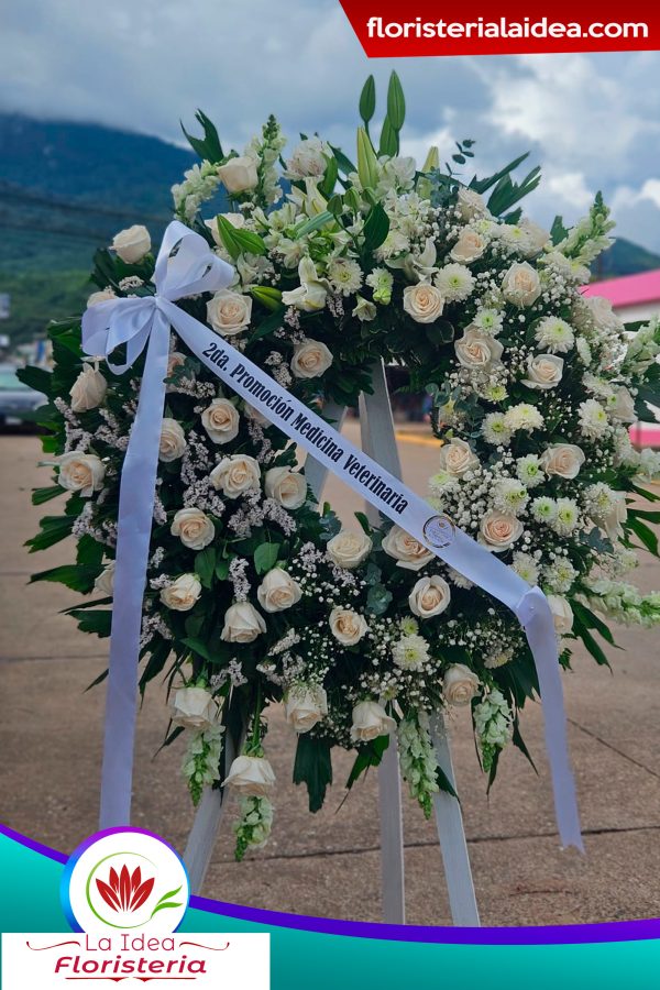 Corona fúnebre de flores blancas